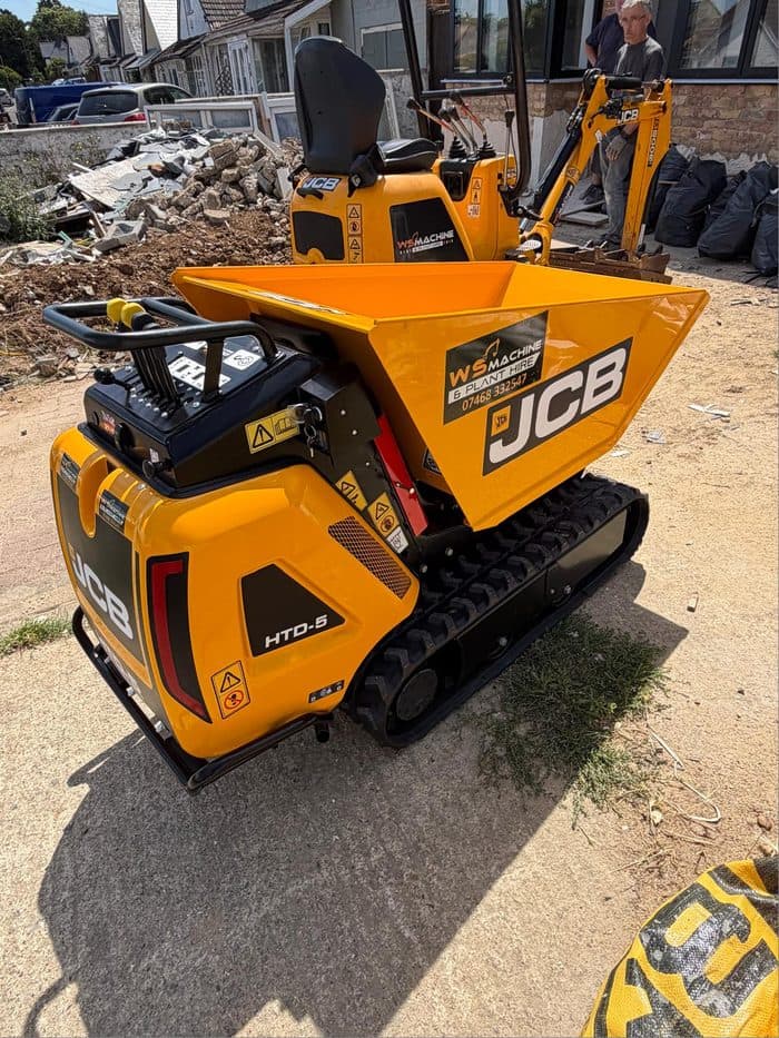 WS Machine mini excavator and dumper clearing a demolition site